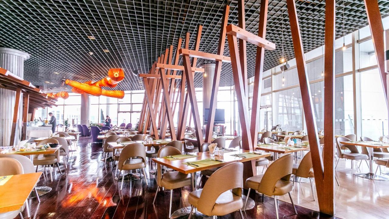 Holiday Inn Binhai Тяньцзинь Экстерьер фото