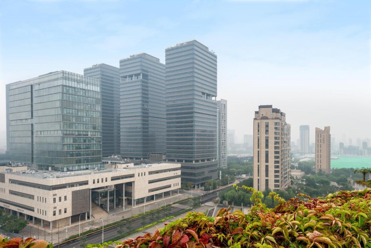 Holiday Inn Binhai Тяньцзинь Экстерьер фото
