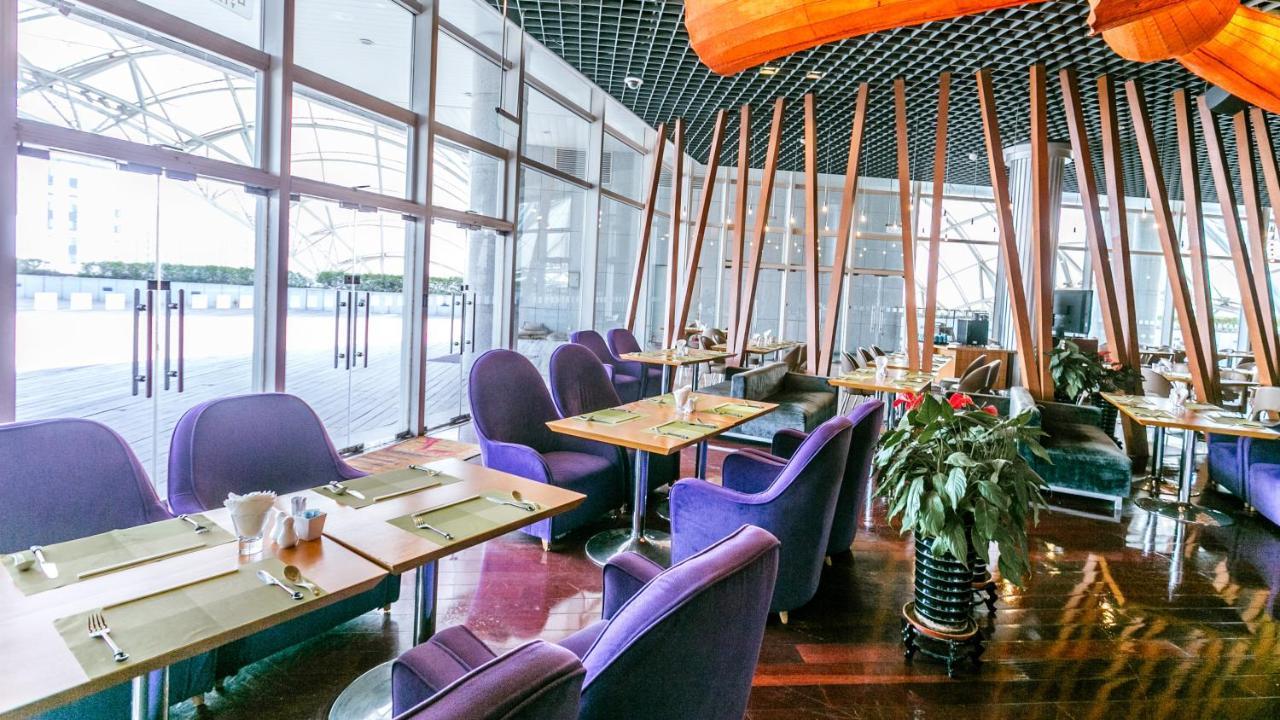 Holiday Inn Binhai Тяньцзинь Экстерьер фото