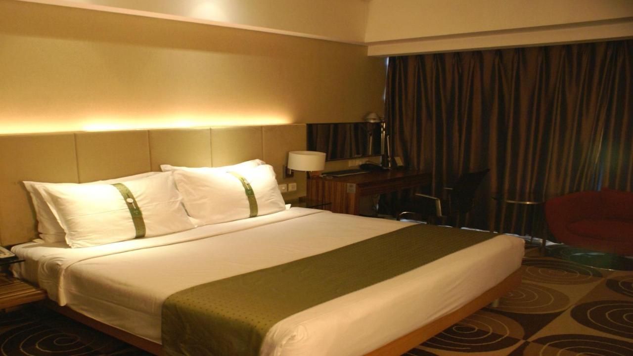 Holiday Inn Binhai Тяньцзинь Экстерьер фото