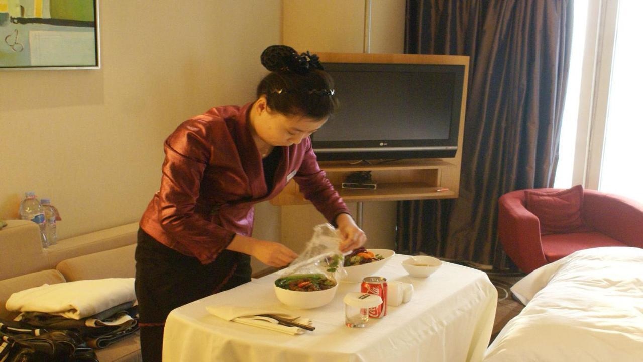 Holiday Inn Binhai Тяньцзинь Экстерьер фото