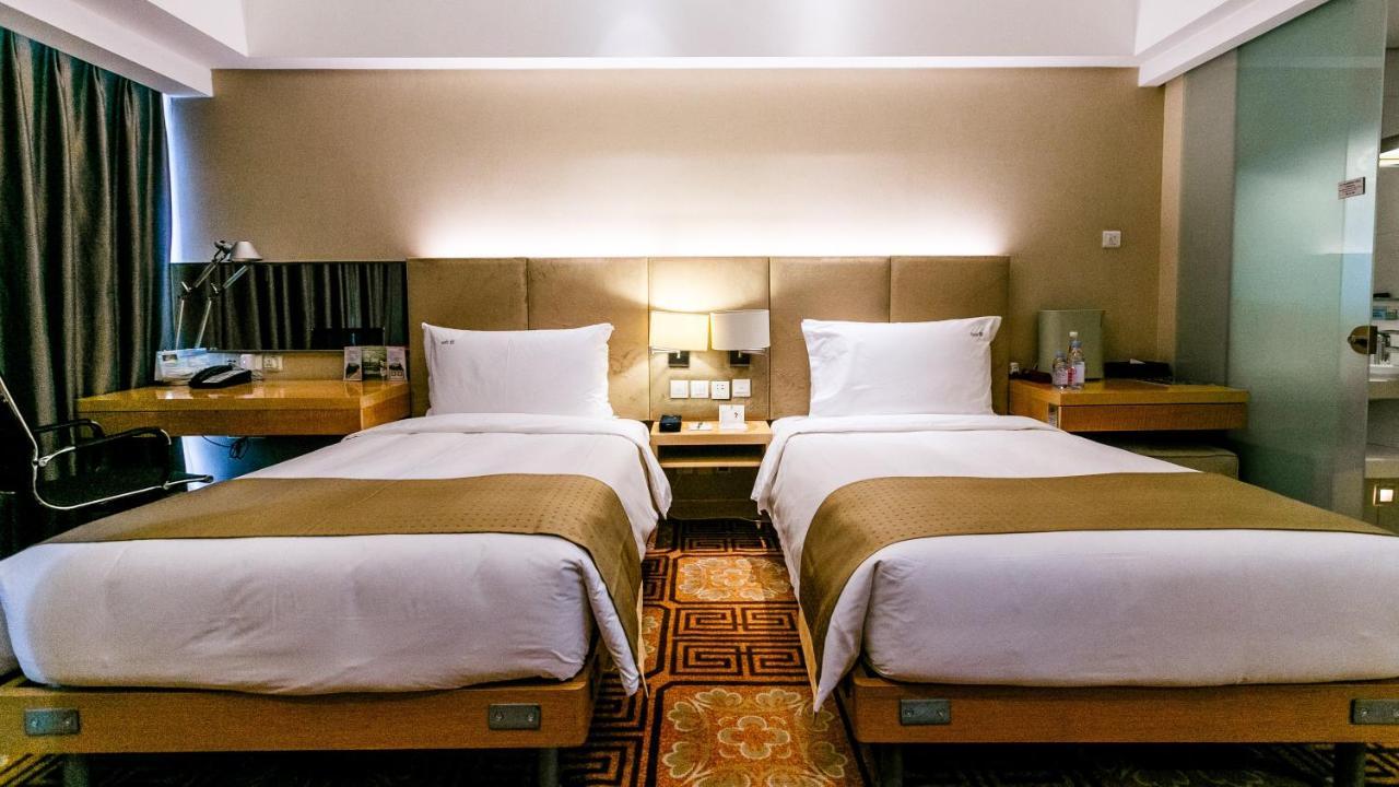 Holiday Inn Binhai Тяньцзинь Экстерьер фото