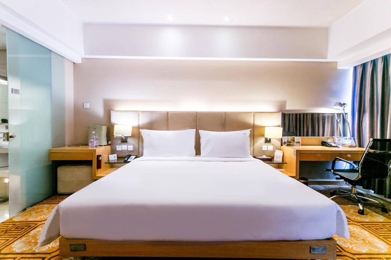Holiday Inn Binhai Тяньцзинь Экстерьер фото