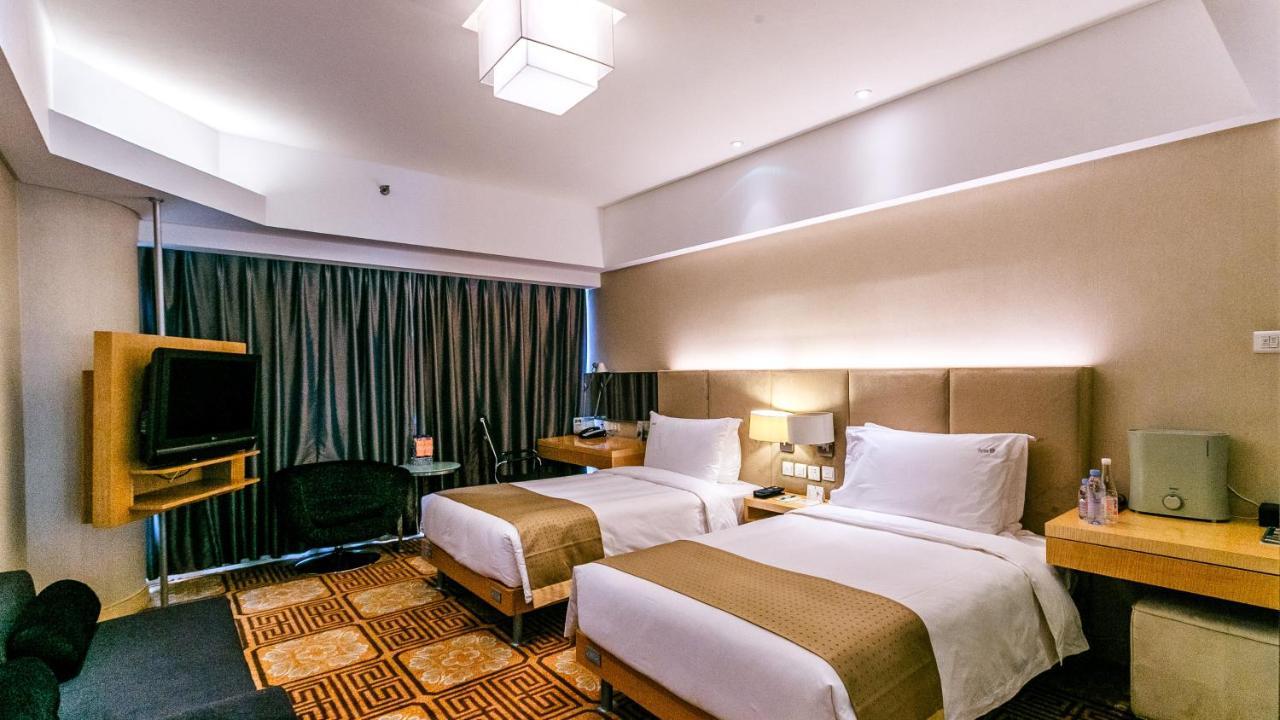 Holiday Inn Binhai Тяньцзинь Экстерьер фото