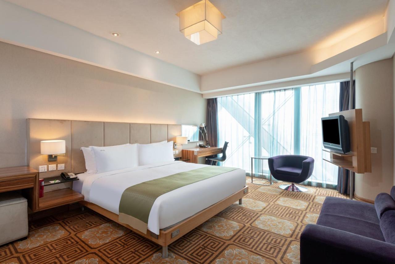 Holiday Inn Binhai Тяньцзинь Экстерьер фото