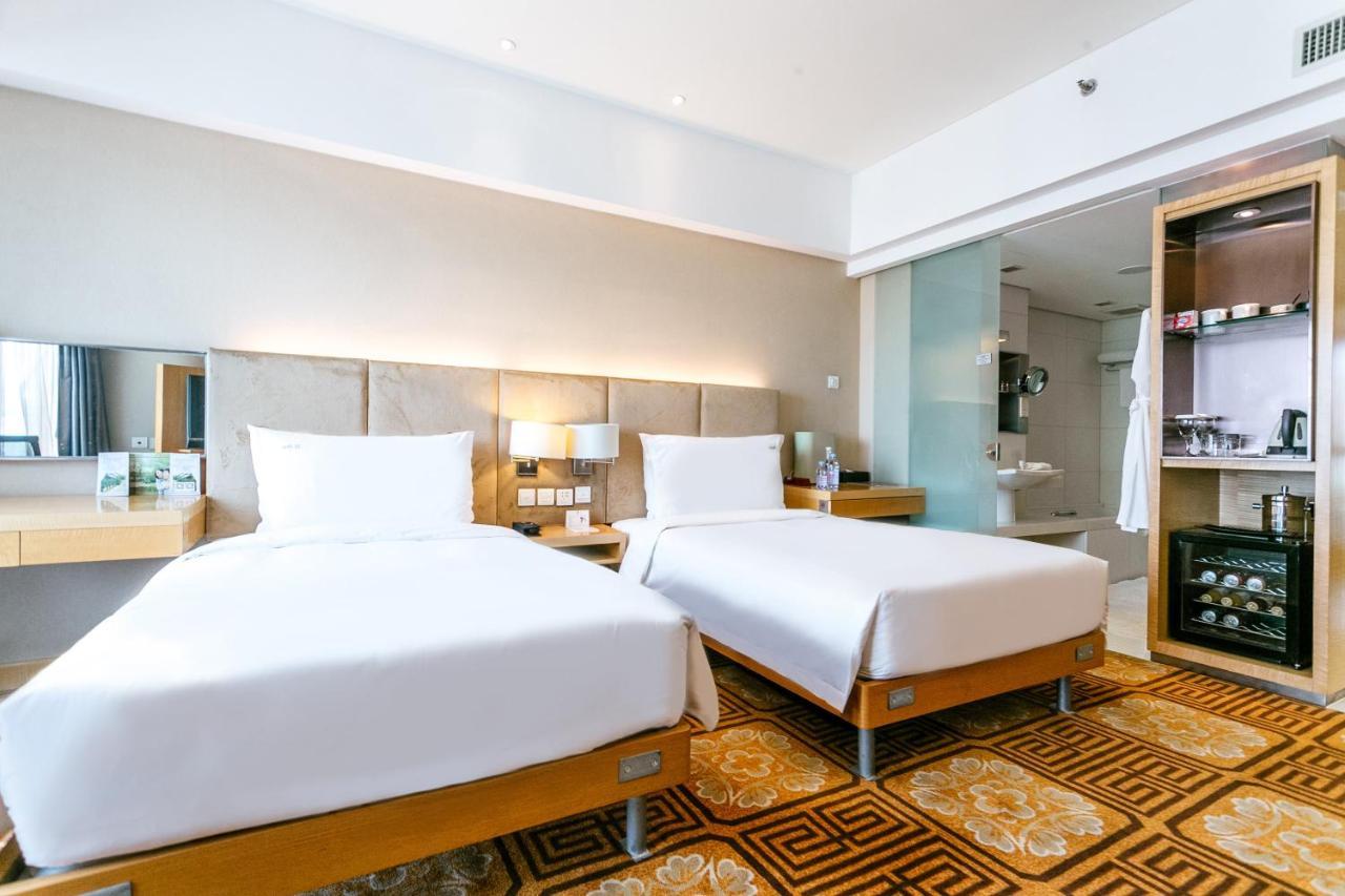 Holiday Inn Binhai Тяньцзинь Экстерьер фото